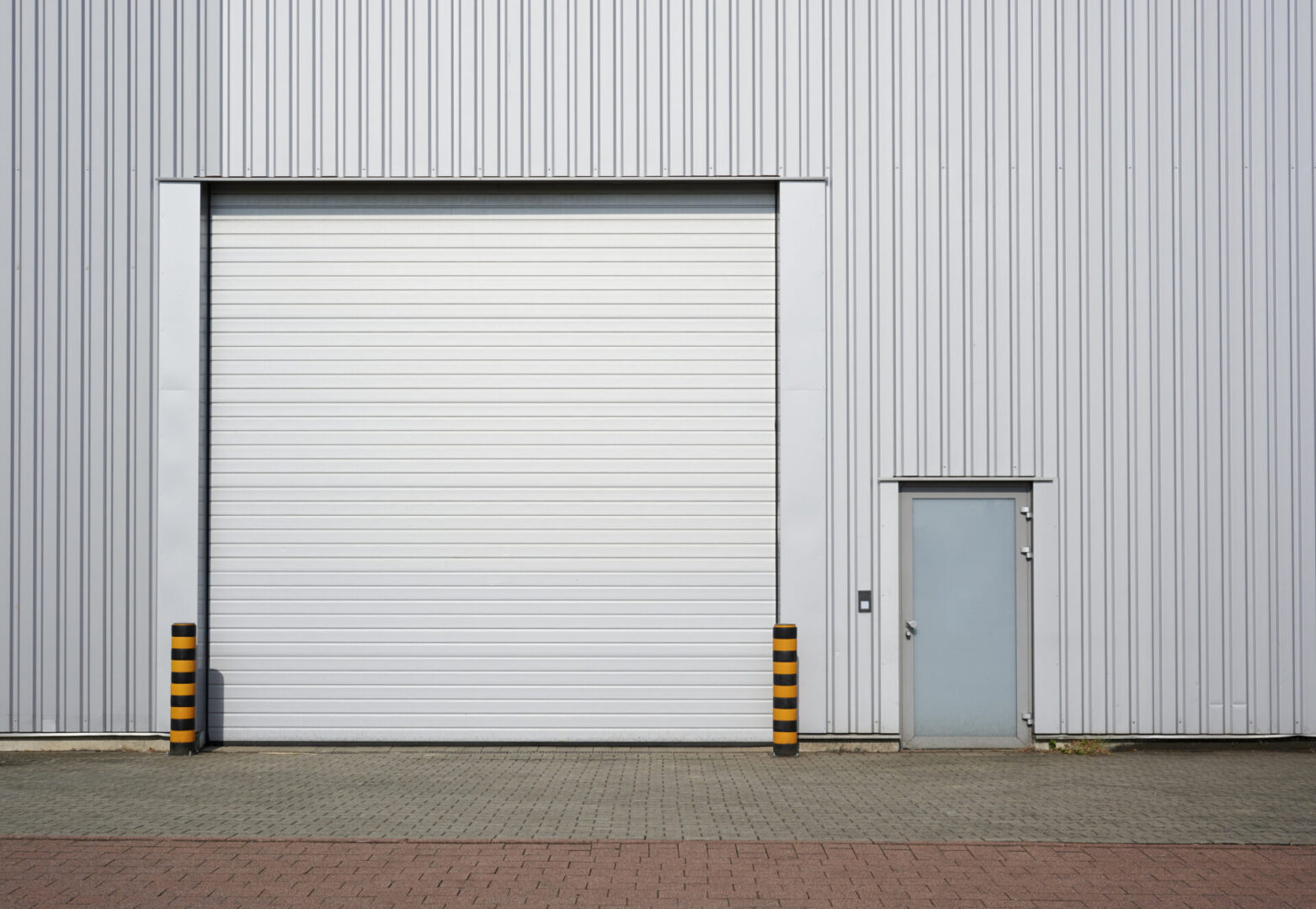 Modern rolling garage door of an industrial building.